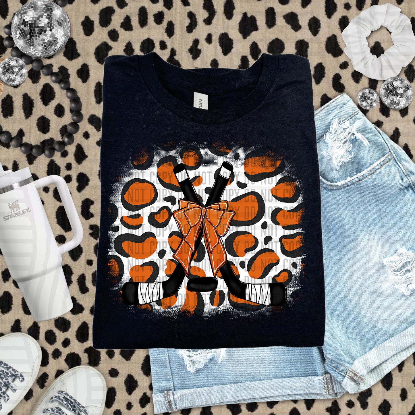 HOCKEY LEOPARD BACKGROUND TEE